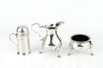 Lot 855 - A George III silver cream jug, with scroll...