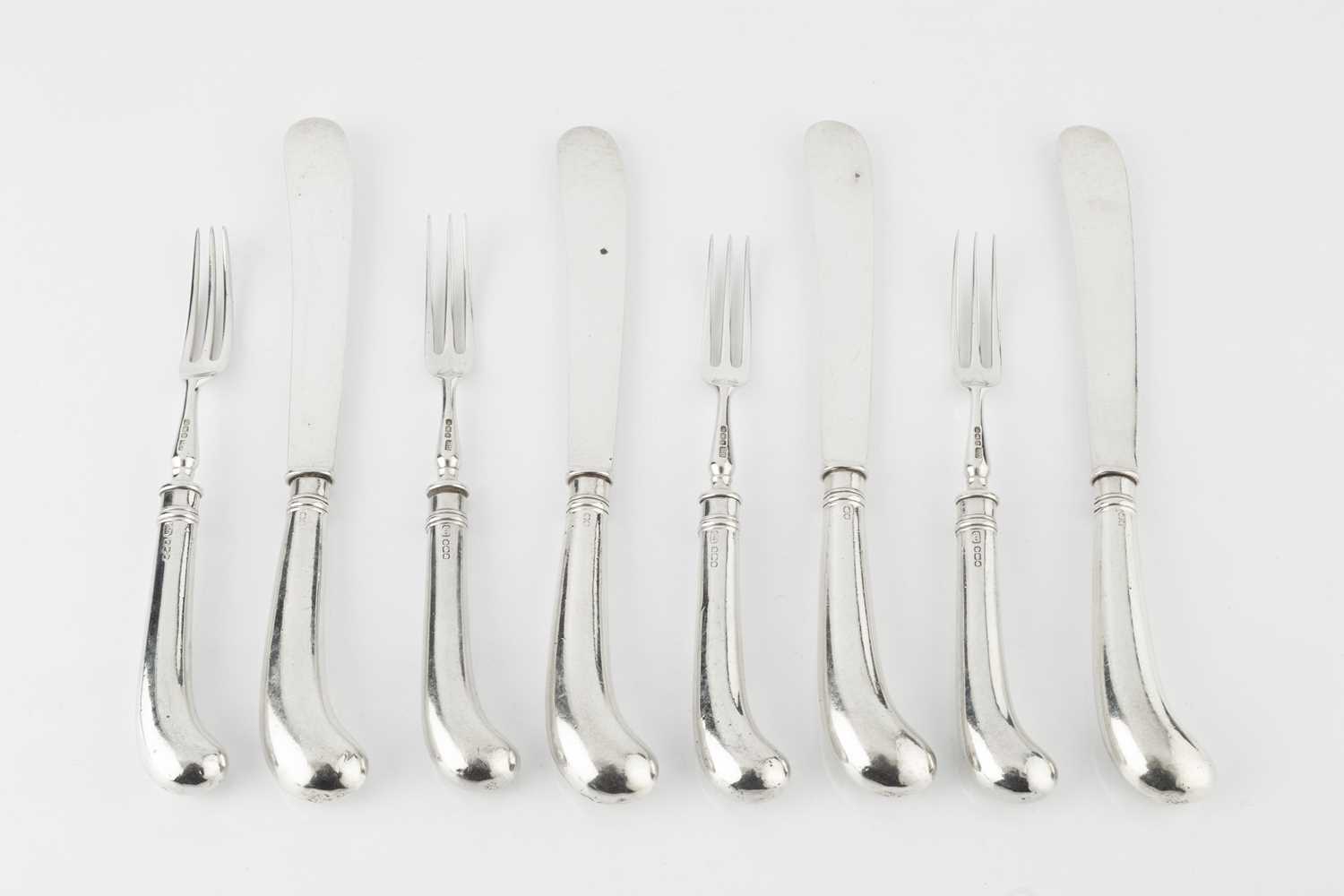 Lot 856 - A set of six George V silver dessert knives...