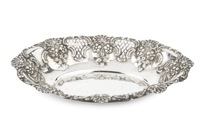 Lot 859 - An Edwardian silver oval dish, repoussé...