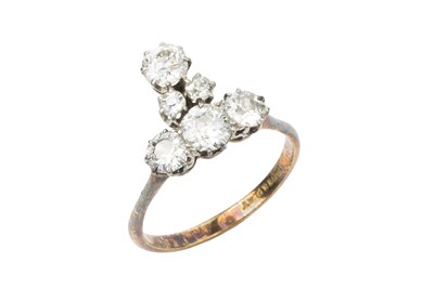 Lot 146 - A diamond cluster ring, set with four...