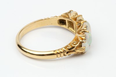 Lot 148 - An opal and diamond five stone ring, the...