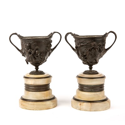 Lot 23 - A pair of 19th century Grand Tour bronze urns...