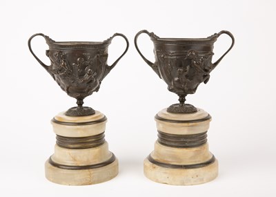 Lot 23 - A pair of 19th century Grand Tour bronze urns...