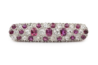 Lot 154 - A ruby and diamond panel brooch, of slightly...