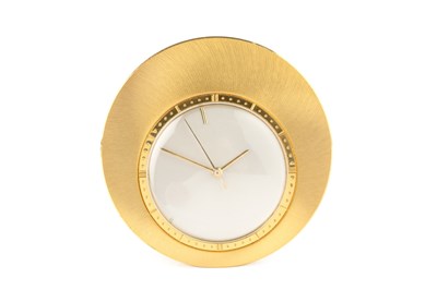 Lot 624 - A Jaeger-LeCoultre gold plated circular travel...