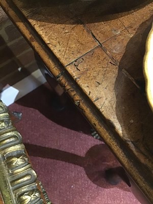 Lot 405 - An 18th century walnut low boy with three...
