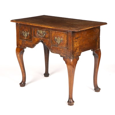 Lot 405 - An 18th century walnut low boy with three...