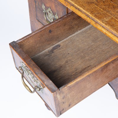 Lot 405 - An 18th century walnut low boy with three...