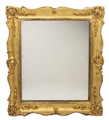 Lot 404 - An antique mirror plate mounted in a gilded...