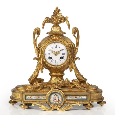 Lot 243 - A 19th century French gilt brass mantle clock,...