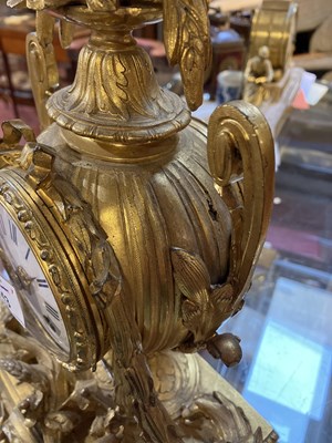Lot 243 - A 19th century French gilt brass mantle clock,...