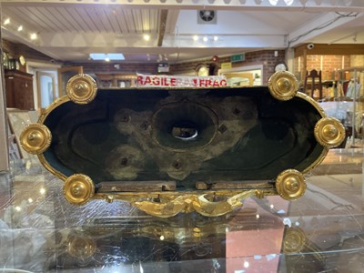Lot 243 - A 19th century French gilt brass mantle clock,...