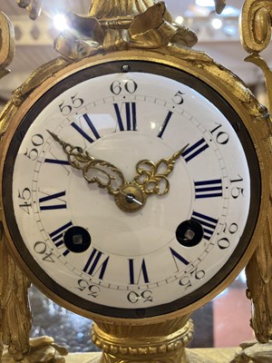 Lot 243 - A 19th century French gilt brass mantle clock,...