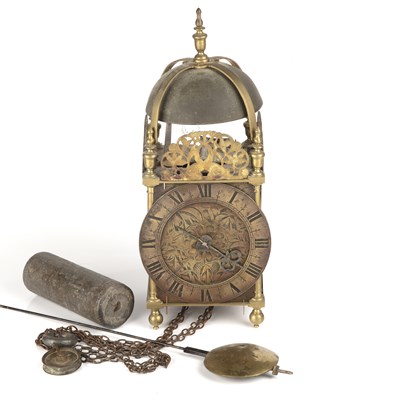 Lot 247 - A 17th century brass lantern clock, the Roman...