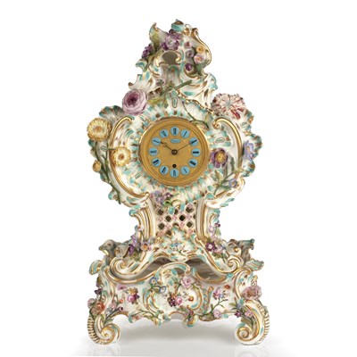 Lot 189 - A 19th century porcelain mantel timepiece, the...