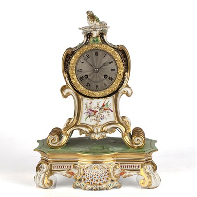 Lot 262 - A 19th century porcelain mantel clock with...