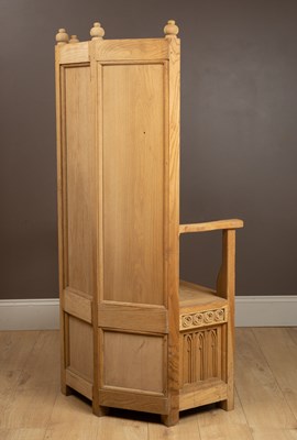 Lot 250 - A Gothic Arts and Crafts hand-carved oak throne chair