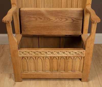Lot 250 - A Gothic Arts and Crafts hand-carved oak throne chair