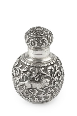 Lot 556 - A late 19th century Anglo-Indian silver scent...