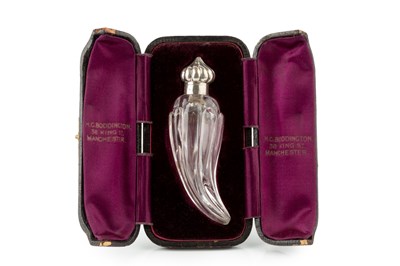 Lot 561 - A late Victorian silver mounted glass scent...