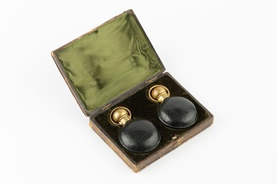 Lot 585 - A pair of late Victorian green leather cased...