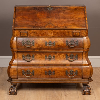 Lot 216 - A walnut bombe bureau