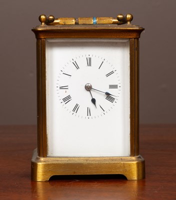 Lot 192 - A brass carriage clock