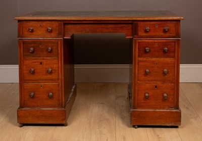 Lot 156 - An old mahogany leather inset pedestal desk