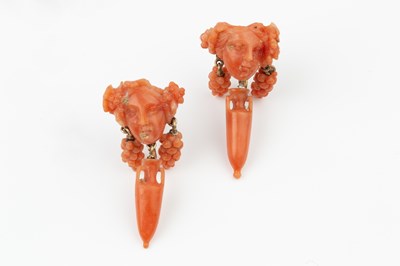 Lot 162 - A suite of carved coral jewellery, comprising...