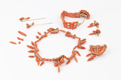 Lot 162 - A suite of carved coral jewellery, comprising...
