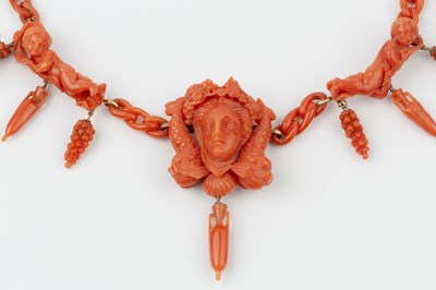 Lot 162 - A suite of carved coral jewellery, comprising...