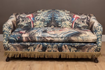 Lot 253 - A sofa with verdure tapestry style upholstery