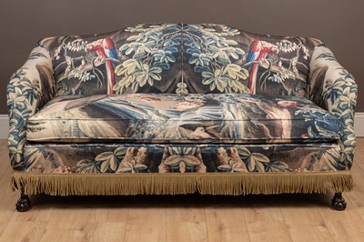 Lot 94 - A sofa with verdure tapestry style upholstery