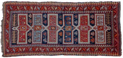 Lot 267 - An early 20th century Kazak wide runner