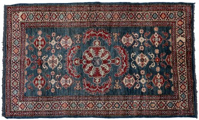 Lot 271 - A blue ground rug