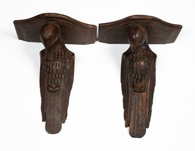 Lot 283 - A pair of carved Indian style hardwood wall brackets