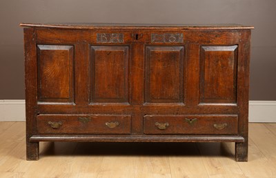 Lot 492 - An 18th century oak mule chest