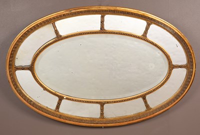 Lot 239 - An Adams style oval wall mirror