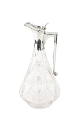 Lot 863 - A George V silver mounted cut glass claret jug,...