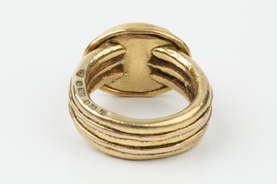 Lot 185 - An 18ct gold and rutilated quartz set ring,...