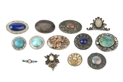 Lot 184 - A collection of Arts and Crafts style brooches,...