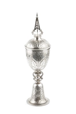 Lot 869 - A George V silver Arts & Crafts steeple cup...