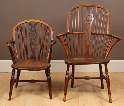 Lot 1065 - Two early 19th century ash and elm Windsor armchairs