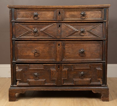 Lot 1047 - A 17th or 18th century oak chest of drawers