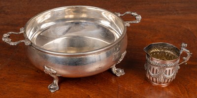 Lot 400 - A white metal plated cup and a silver plated dish