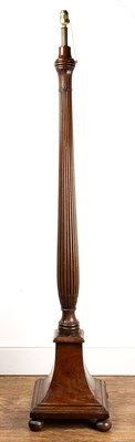 Lot 7 - Mahogany standard lamp of reeded form, with a...