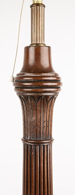 Lot 7 - Mahogany standard lamp of reeded form, with a...
