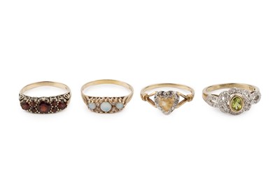 Lot 216 - A 9ct gold, citrine and diamond dress ring,...