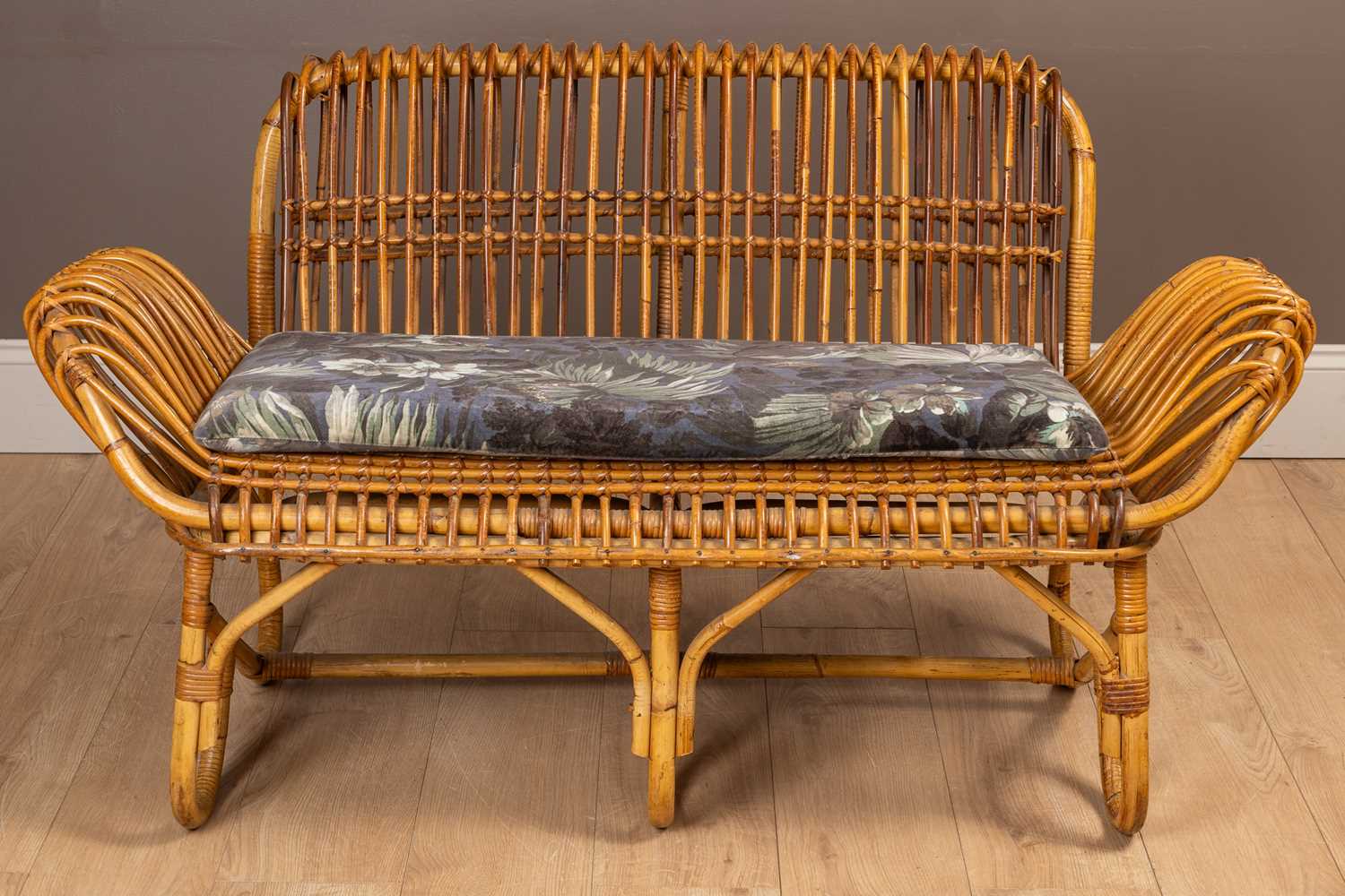 Lot 11 - A wicker framed two-seater sofa