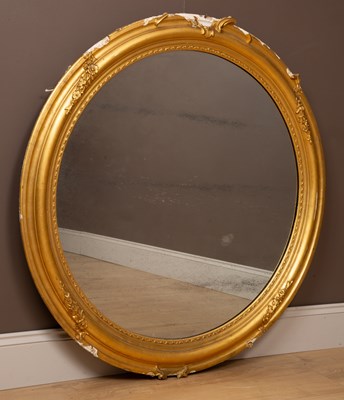 Lot 429 - A large circular 19th century gilt framed wall mirror